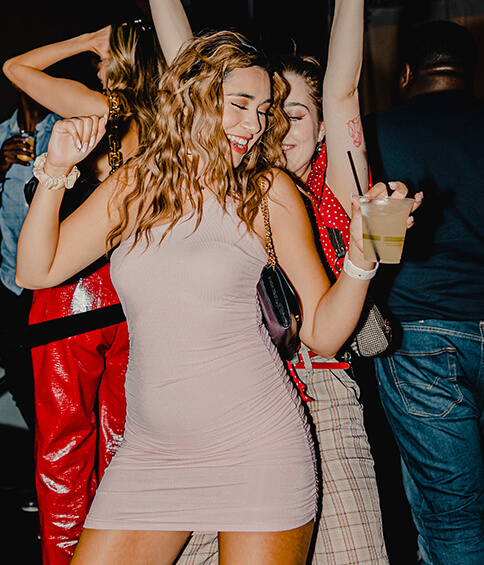 young lady dancing at a bar